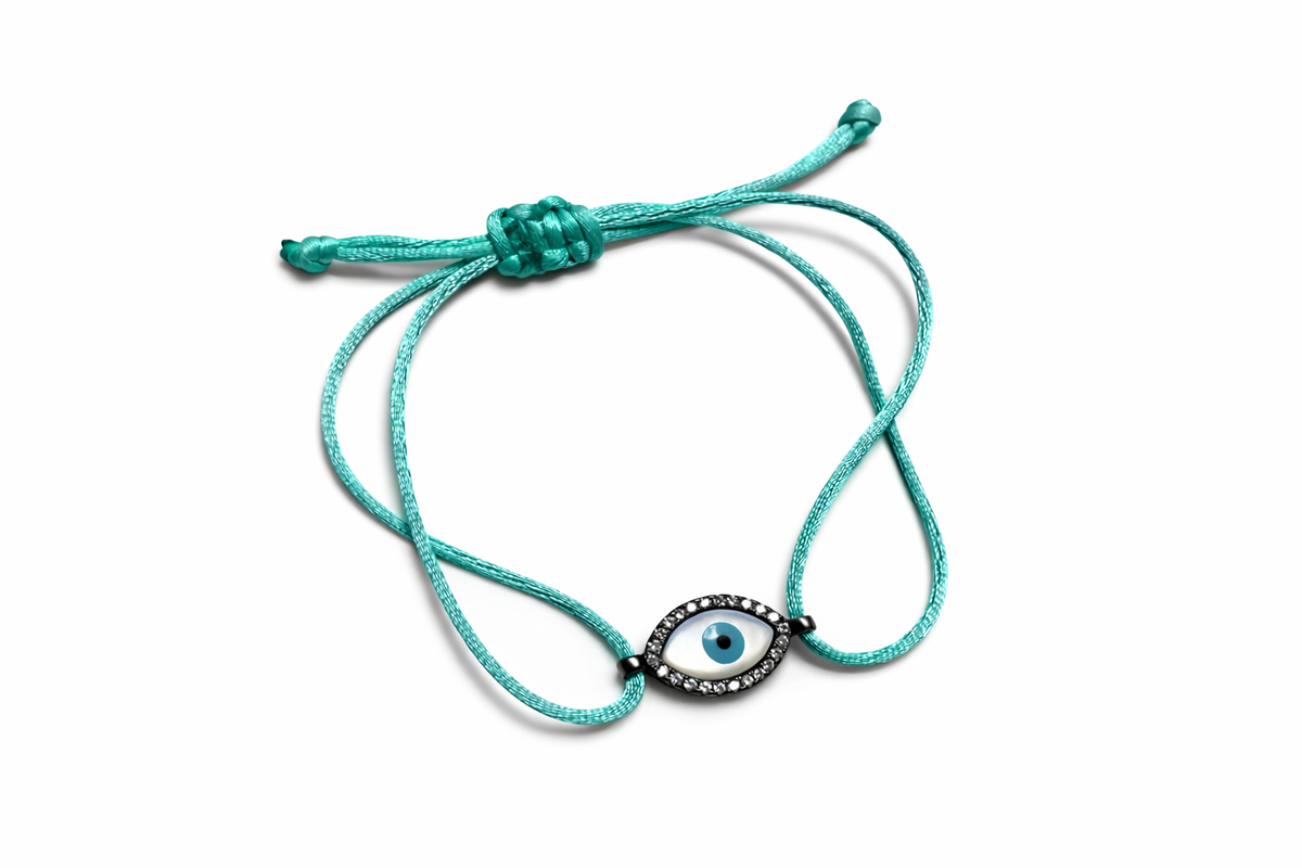 Pulseira fio de seda olho grego