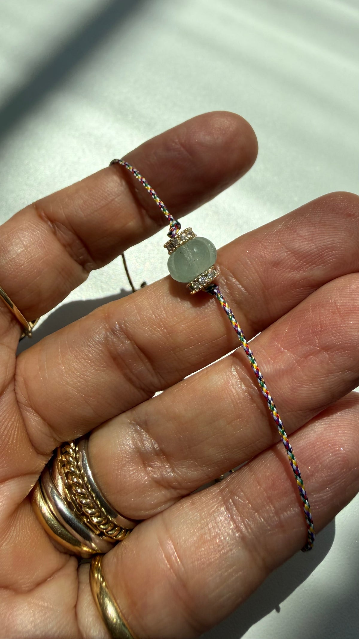 Pulseira fio de seda pitangas