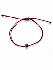Pulseira fio de seda com Safira azul cobochon