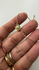 Pulseira fio de seda pitangas