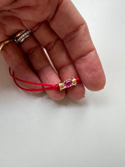 Pulseira fio de seda entremeio pedras