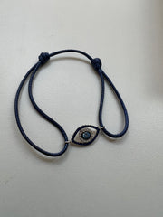 Pulseira fio de seda olho grego