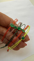 Pulseira fio de seda com safira verde gota