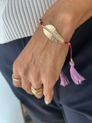 Pulseira tassel pena