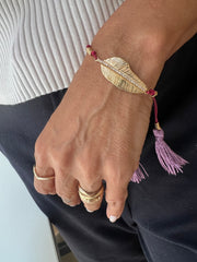 Pulseira tassel pena