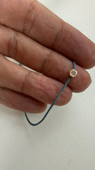 Pulseira colorida fio de seda elementos