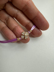 Pulseira trevo fio de seda