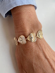 Pulseira olho grego coração